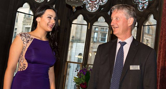 Zulikhat Shavaeva accepts her award from Graham Able