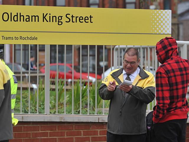 METROLINK and police patrolling at the King Street stop in Oldham