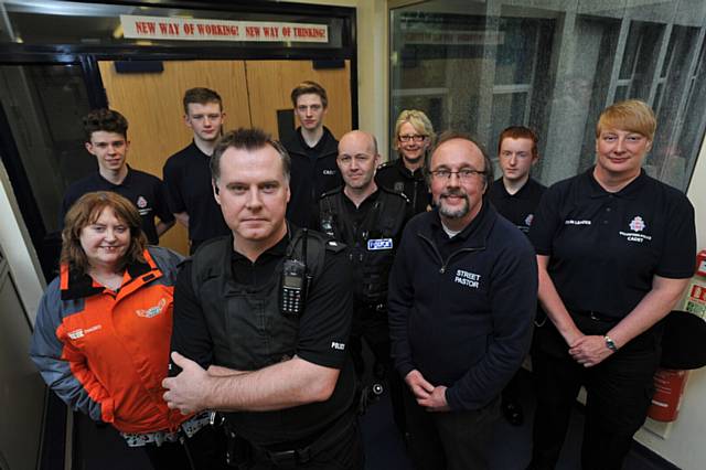 LEFT to right: Rev Jean Hurlston (Oldham Street Angels), cadet Ciaran Collins, cadet Rob Slater, Insp Trevor Harrison, cadet Aaron Bell, Special Insp Matt Saville, Insp Karen Taylor, Graham Radcliffe (street pastor), cadet Luke Blair and PCSO Sue Hoyle (cadet leader). 