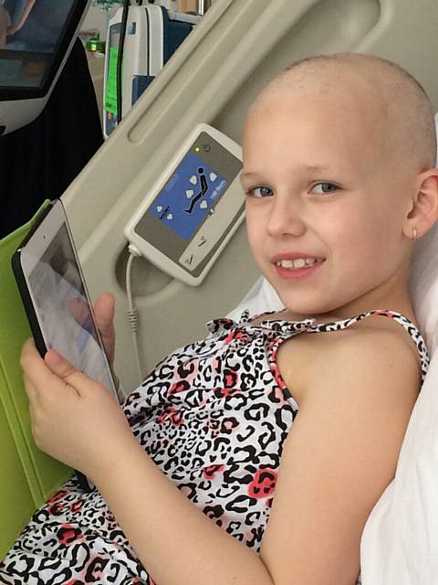 BRAVE... Eva Clayton receiving treatment at the Royal Manchester Children's Hospital