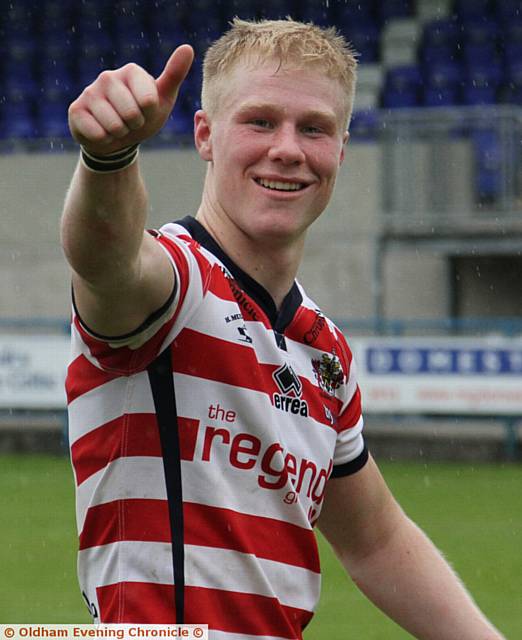 HAPPY MAN . . . Kieran Gill is all smiles after Oldham's morale-boosting victory 