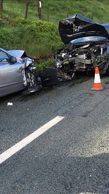 EMERGENCY services deal with the Holmfirth Road crash. 

