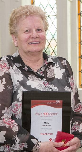 MARY Moulton from Chadderton collects her award and certificate for 100 blood donations MARY Moulton from Chadderton collects her award and certificate for 100 blood donations