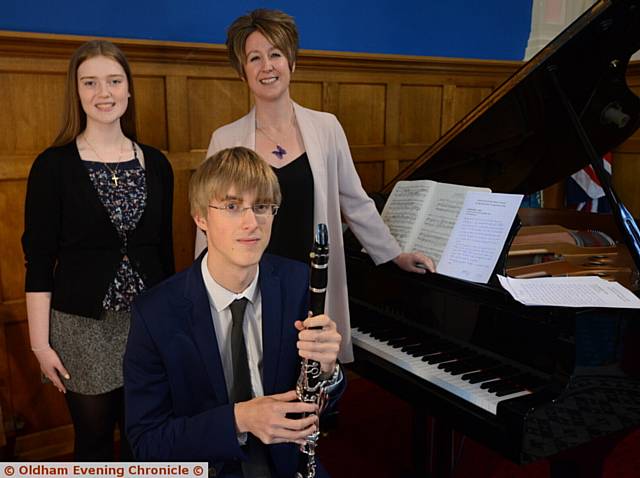 PICTURED left to right, Caroline Blair (16), voice runner-up, Aaron Hartnell-Booth (18) winner, clarinet, Dr. Sarah Murphy, adjudicator