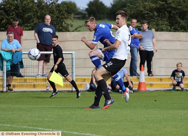 SHOOT ON SIGHT . . . Athletic forward Billy Mckay gets an effort away against AFC Fylde. 