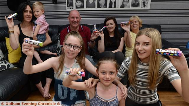 SMARTIE party . . . (back, from left) Lisa's sister Ally Ziemniak, Lisa's son Zac, Lisa's father Robert Parkisson, Annie Jones (niece) and mother Judith Smith. Front: nieces Heidi, Tilly and Jessie
