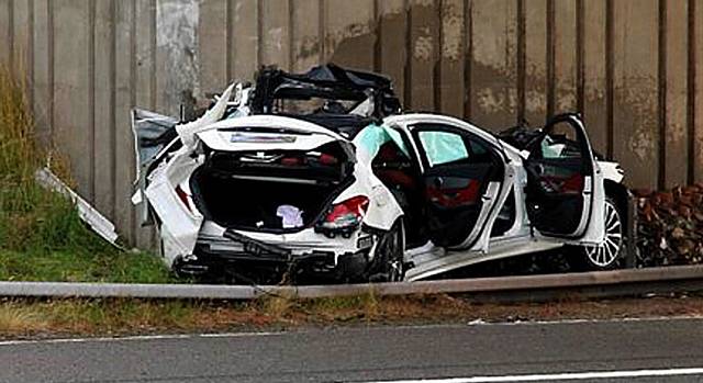 WRECKAGE . . . the car after the accident