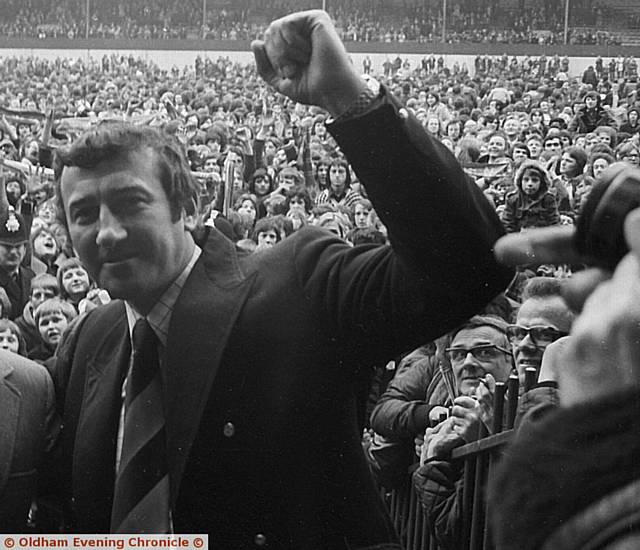 A WINNER . . .  Frizzell punches the air in delight after Oldham Athletic claim the Third Division title in 1974