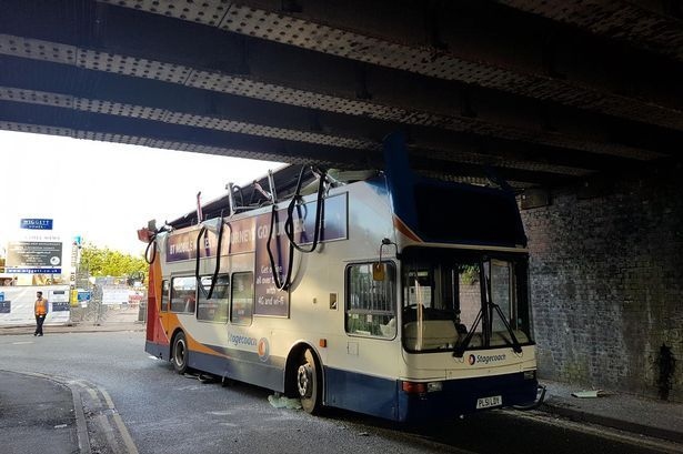 Bus crashes into the railway bridge between Joshua Lane and Mills Hill Road