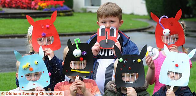 MASK makers . . . Scarlett Grimshaw Oscar Ryder and Maisy Warburton. Front: Samuel Dickenson, Jacob Grimshaw and Sam Bell