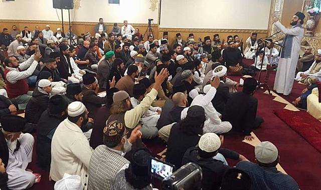 Pakistani clerics who praised an Islamist assassin in Pakistan speaking at a mosque in Oldham. Pictured is Hassan Haseeb ur Rehman
