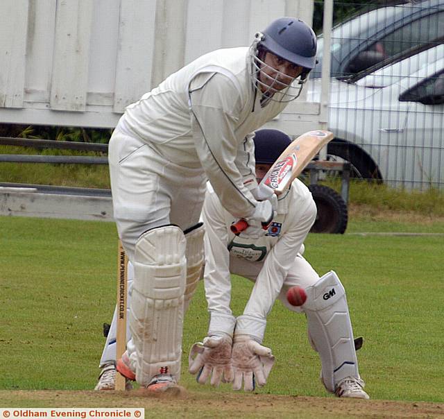 TON-UP . . . Heyside professional Bilal Khiljee plays the ball towards the leg side against Uppermil