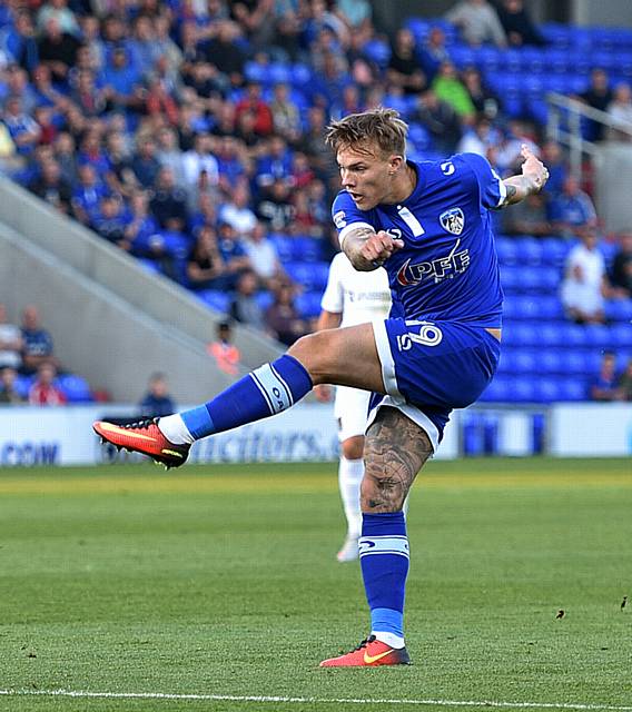 DENIED . . . Athletic forward Lee Erwin hit the crossbar at Coventry