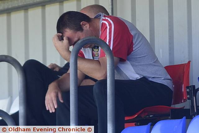 OLDHAM coach Scott Naylor turns away as his side slip to a heavy defeat. 