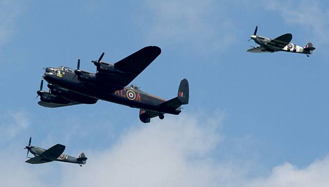 The Battle of Britain Memorial flight over Uppermill, Oldham. During the Yanks weekend held in the village.
