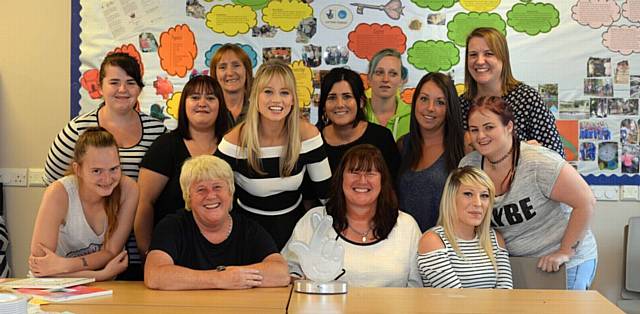 SINGER and TV presenter Kimberly Wyatt on a recent visit to the centre to present the National Lottery Award to the Key to the Door TOYS project