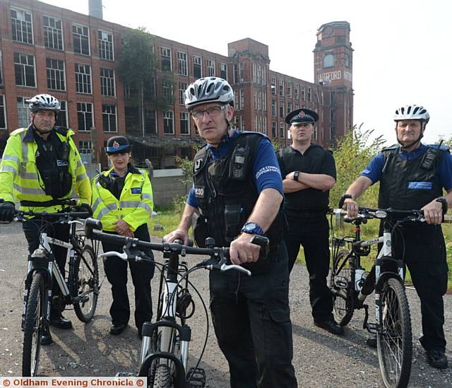 KEEP away from Hartford Mill . . . from left, PCSOs Mike Quarmby, Jacqui Haslam, Peter Kiba, Sgt Simon Halliwell and PCSO Norman Dodd