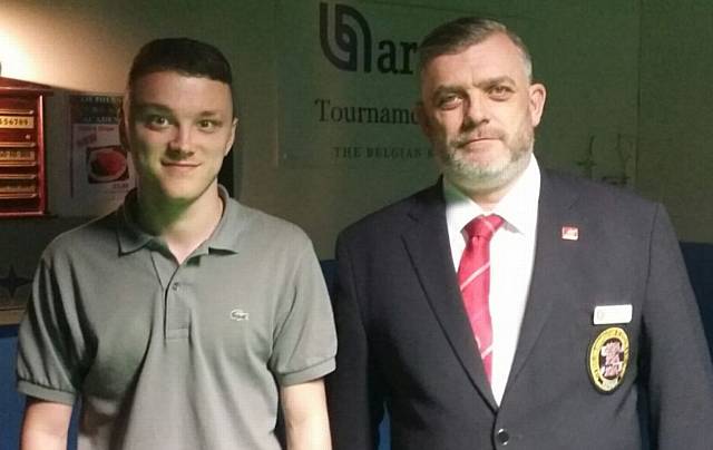 AT THE DOUBLE . . . Joshua Cooper (left) with referee Ian Wallwork