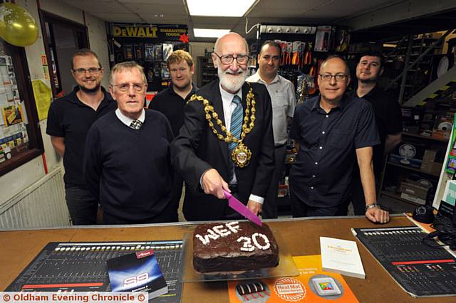 Wholesale Electrical Factors (WEF) is 30 years old. The mayor of Oldham Cllr Derek Heffernan visits. PIC L-R: Daniel Miller, John Cartwright (MD), Shaun Higginbottom, Mayor, Noel Whelan, Simon Reeves (General Manager) and Chris Cartwright..