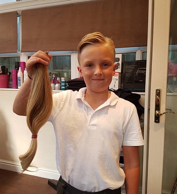 Sidney Brown (10) from Chadderton had 18 inches of his hair chopped for charity.