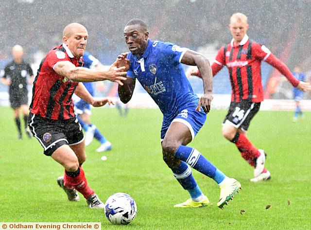 A DETERMINED Freddie Ladapo looks for a way through