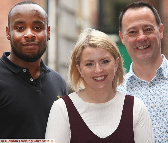 OLDHAM Pride nomination . . . from left, Eric Osazee, volunteer co-ordinator, Clare Boyle, young carer support worker, Martin Sutton, project manager