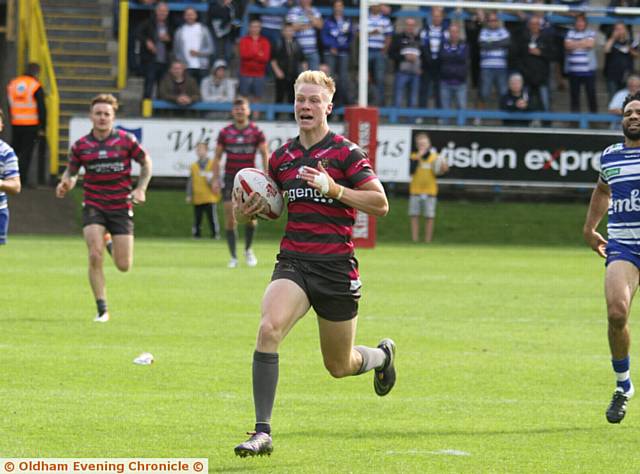 TWO-UP . . . Kieran Gill takes up possession and races home for his second try