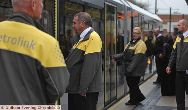 JUST the ticket . . . inspectors hunt ticket evaders at Oldham's King Street stop