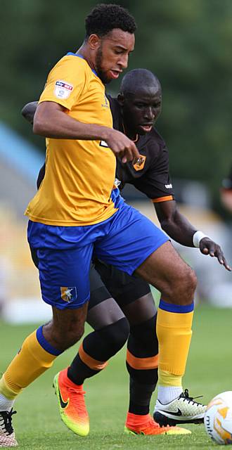 FORMER Rochdale player Rhys Bennett covers the right-hand side of defence at Field Mill