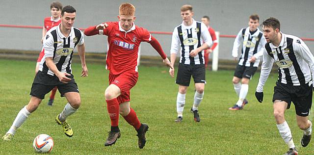 ON THE MARK . . . Aaron Scholes (red shirt)