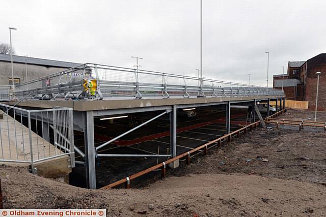 New multi-storey car park at Prince's Gate, Mumps for Metrolink users, almost finished.