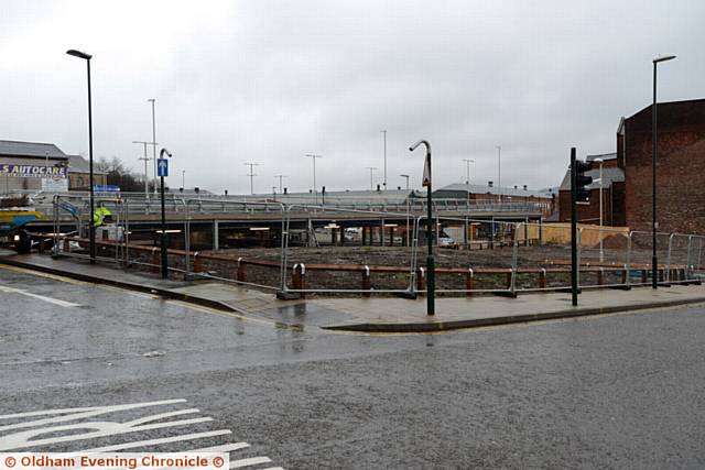 New multi-storey car park at Prince's Gate, Mumps for Metrolink users, almost finished.