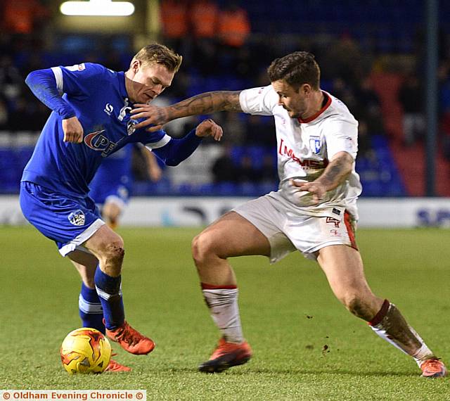 NEAT FEAT...Billy Mckay turns inside his Gills marker