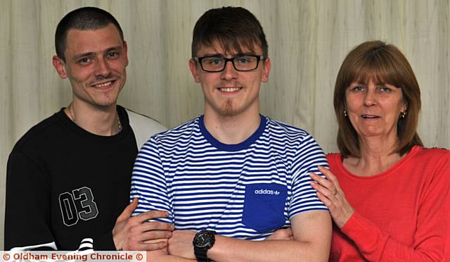 TOP GUY . . . Liam Ure (centre) with brother Michael Ure and mum Catherine Butler TOP GUY . . . Liam Ure (centre) with brother Michael Ure and mum Catherine Butler