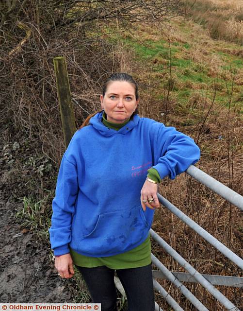 CHRISTINA GATER, Chair of Foxdenton and District Protection Group overlooking the land earmarked for development.