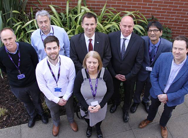 VISIT . . . At Pennine Care are (back l-r) Mike Liffen, Dario Griffiths, Jeremy Hunt, Michael McCourt, Dil Jauffur, Dr Henry Ticehurst. Front: Mark Hepburn and Fiona Christopher VISIT . . . At Pennine Care are (back l-r) Mike Liffen, Dario Griffiths, Jeremy Hunt, Michael McCourt, Dil Jauffur, Dr Henry Ticehurst. Front: Mark Hepburn and Fiona Christopher