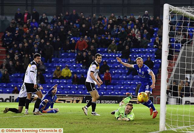 SO CLOSE ...Port Vale goalkeeper Jak Alnwick tips Billy Mckay's stoppage-time shot onto a post