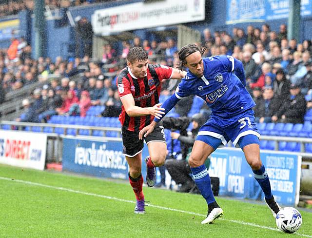 CHECKING IN . . . Athletic are hopeful Charles Dunne will be fit for next week's Trophy clash against Mansfield Town CHECKING IN . . . Athletic are hopeful Charles Dunne will be fit for next week's Trophy clash against Mansfield Town