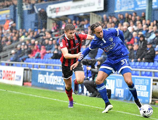 CHECKING IN . . . Athletic are hopeful Charles Dunne will be fit for next week's Trophy clash against Mansfield Town