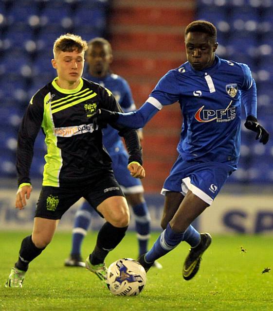 TEENAGE TALENT: Chinedu Uche warmed up with the seniors on match days recently