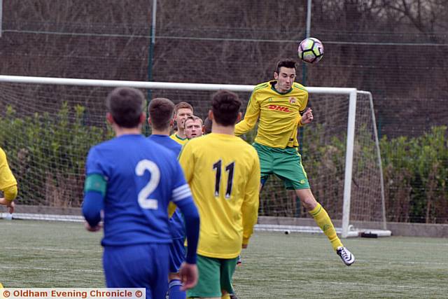 HEADS I WIN... Royton Town's Andrew Staffordgets above his East Manchester opponent in the Premier Division clash at Oldham Academy North. HEADS I WIN... Royton Town's Andrew Staffordgets above his East Manchester opponent in the Premier Division clash at Oldham Academy North.