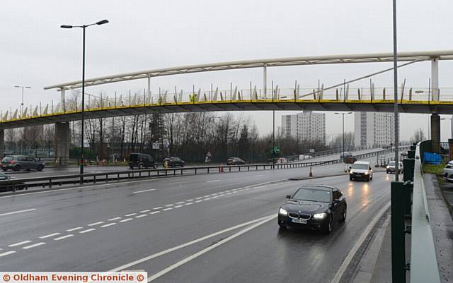 Ongoing repair work on the footbridge over Oldham Way, near Oldham Sixth Form College.