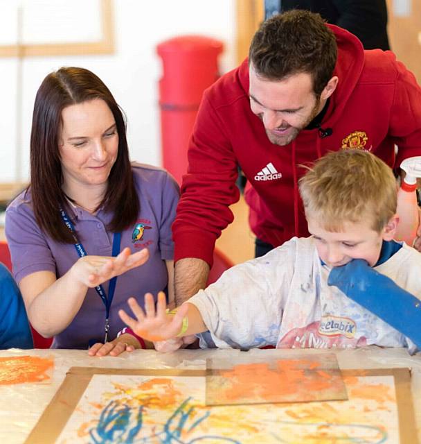 Juan Mata with pupil Liam Lambert and teaching assistant Jill Lomax