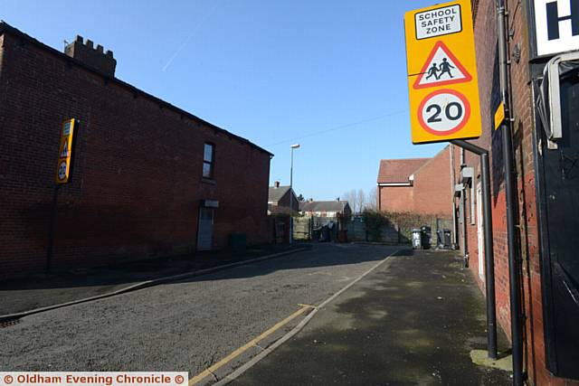 Twenty miles per hour, if you're lucky. Speed limit signs appear at the end of a dead end off Hollins Road, which is only the length of five or six cars.