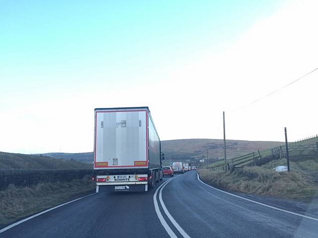 Queues on the A640 going into Denshaw following accident on the M62