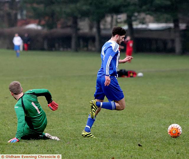 NEAT FEAT . . . Danny McLoughlin rounds the Shelley goalkeeper before putting Diggle ahead NEAT FEAT . . . Danny McLoughlin rounds the Shelley goalkeeper before putting Diggle ahead