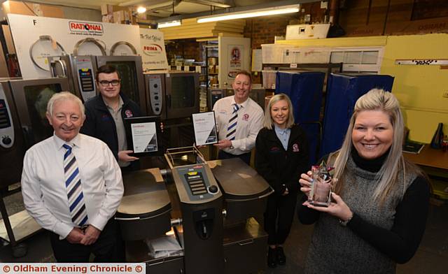 AWARD . . . (from left) Malcolm Normanton (director), Liam Paull (spares co-ordinator), Duncan Normanton (director), Hollie Normanton (service administrator) and Lisa Normanton (director)