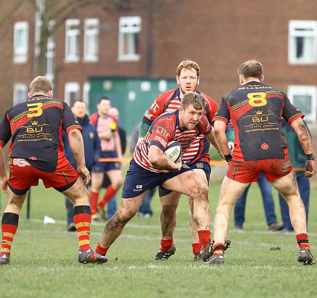 IN POSSESSION . . . Oldham's Gareth Blomeley attempts to make ground for his side