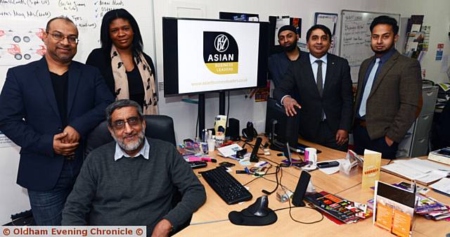 Asian Business Leaders' group is supporting the 2017 Oldham Business Awards. From left, Muz Khan (co-founder ABL), Akhtar Zahid (seated, founding father ABL), Dawn Torrington (head of sponsorship Oldham Business Awards), Karim Ahmed (DSGN UK), Kashif Ashraf (co-founder ABL), Ansar Ali (DSGN UK)