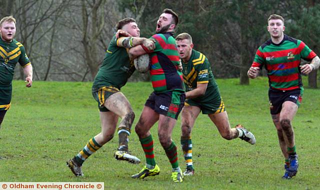 CRUNCH: St Annes' Callum Fletcher clashes with Waterhead's Martyn Sarsfield